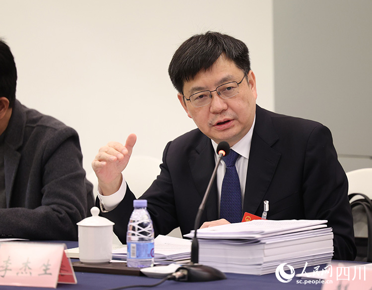 李杰生在會上發(fā)言。人民網(wǎng)記者 王波攝