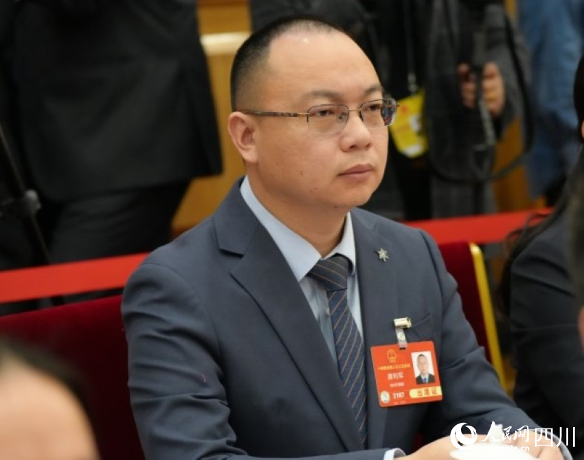 全國人大代表唐利軍。人民網(wǎng)記者 李平攝