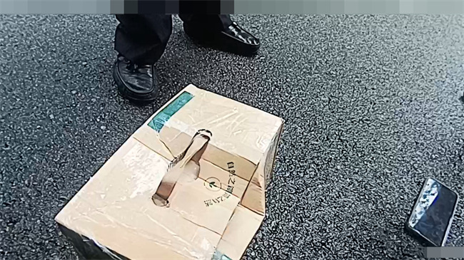 喻某某隨身攜帶的牛奶盒。新都公安供圖